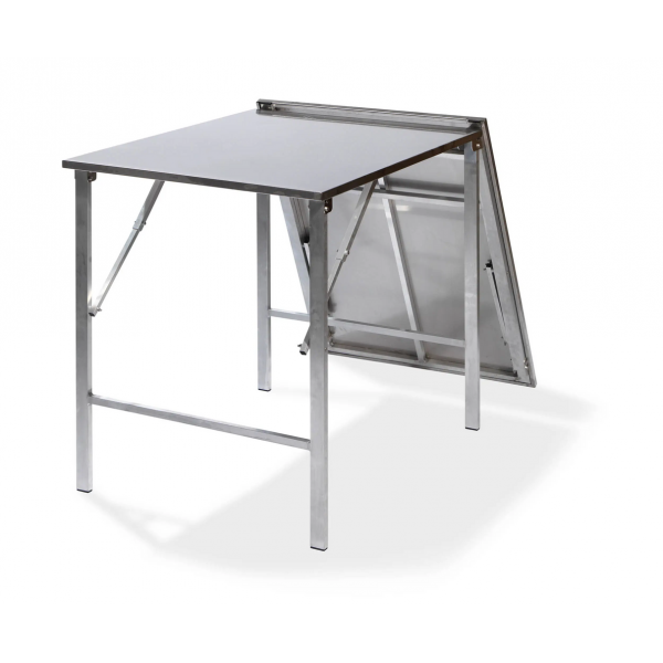 Vue de face de la table pliante pour restauration en inox à demi pliée